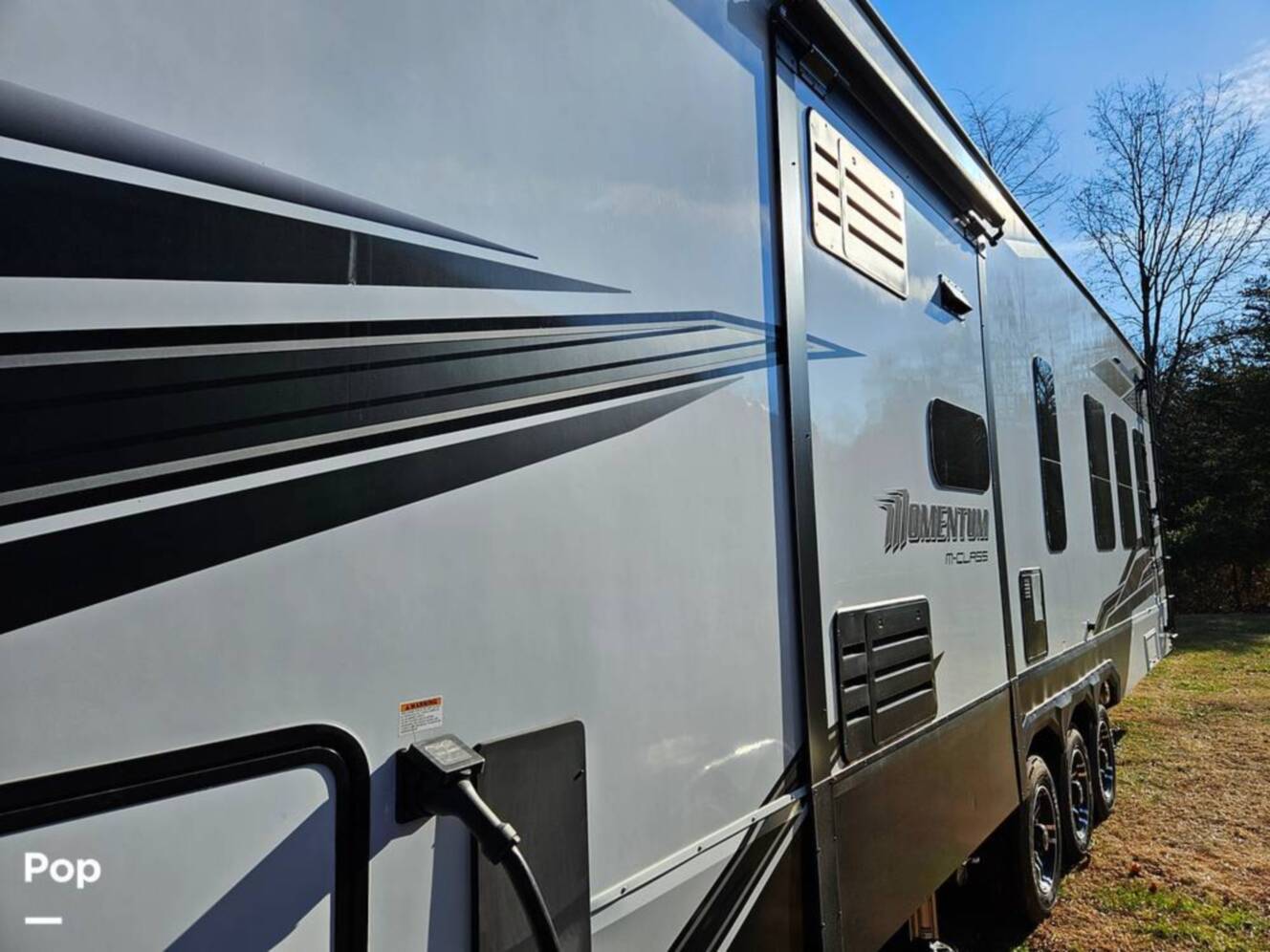 A photo of this 2023 Grand Design Momentum 398M