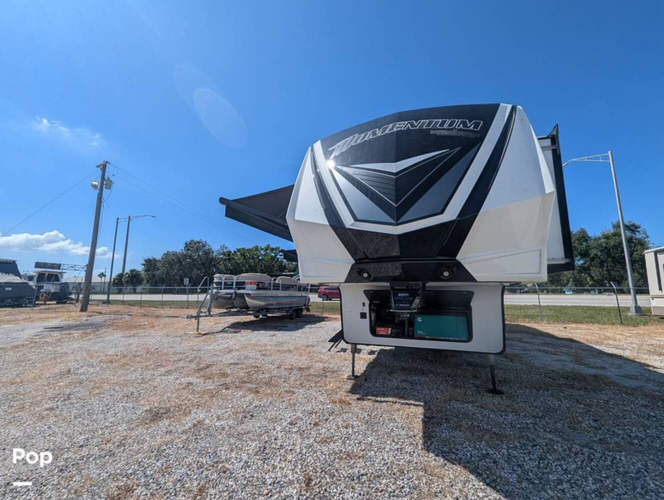A photo of this 2023 Grand Design Momentum 395MS-R