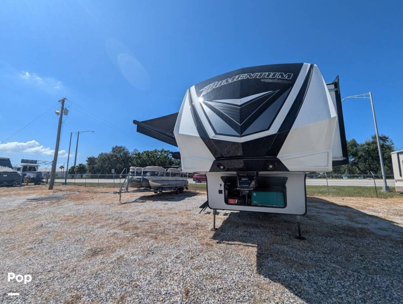 A photo of this 2023 Grand Design Momentum 395MS-R