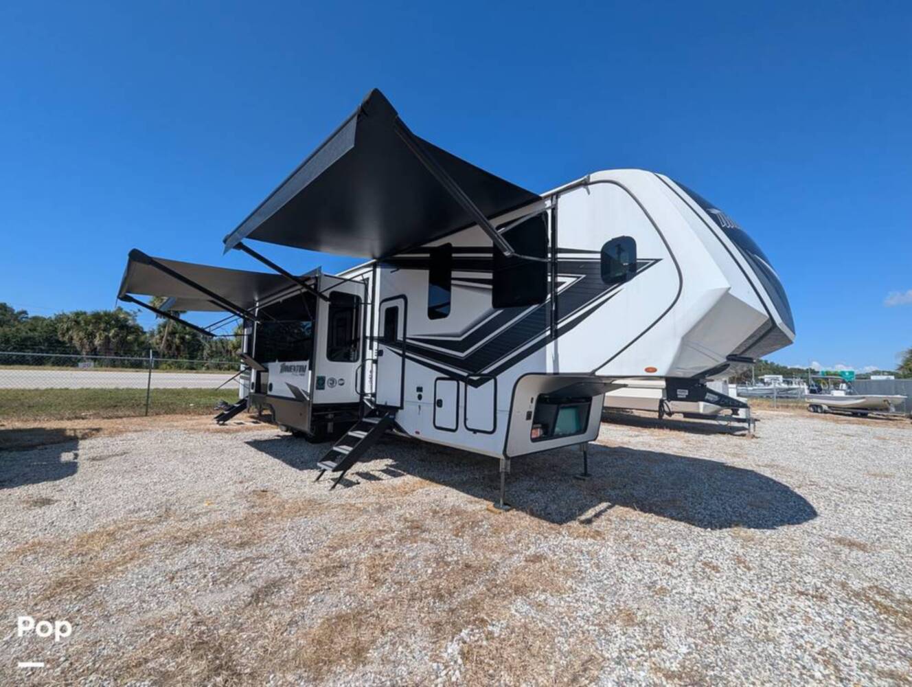 A photo of this 2023 Grand Design Momentum 395MS-R