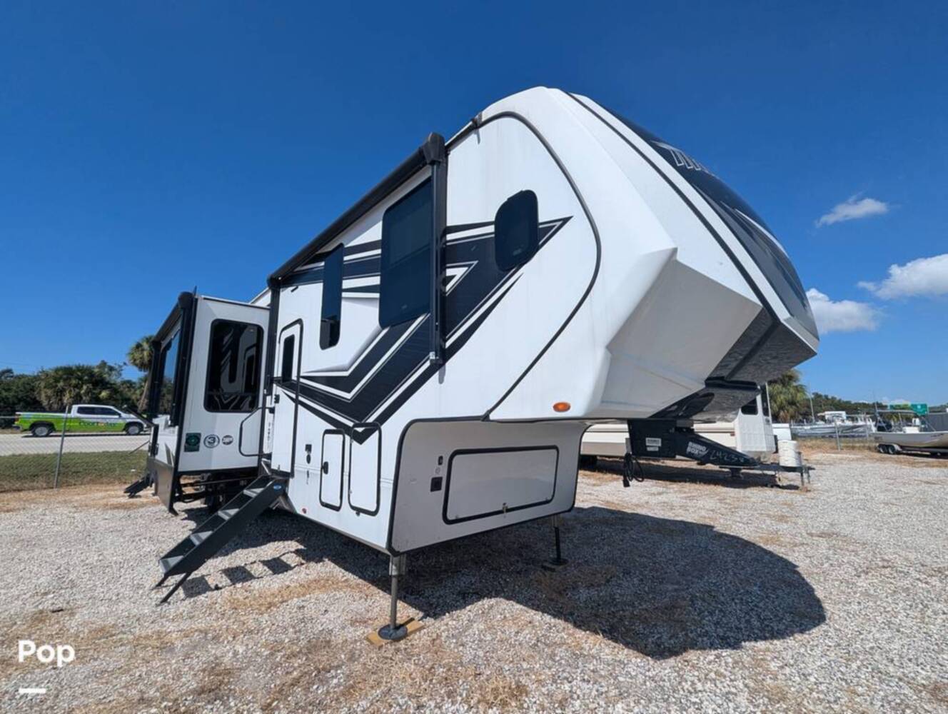 A photo of this 2023 Grand Design Momentum 395MS-R
