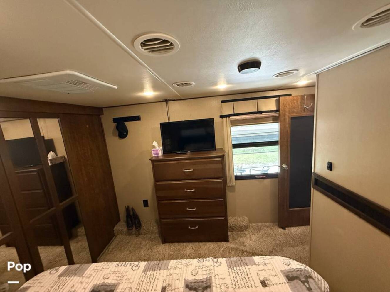 A photo of this 2015 Grand Design Solitude 369RL