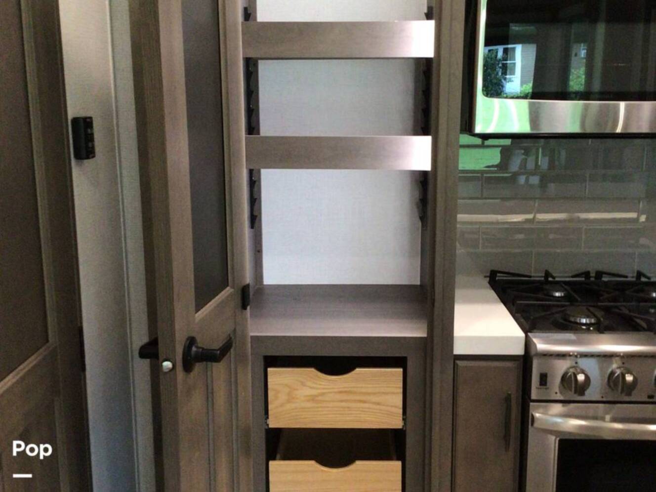 A photo of this 2023 Grand Design Solitude 380FL