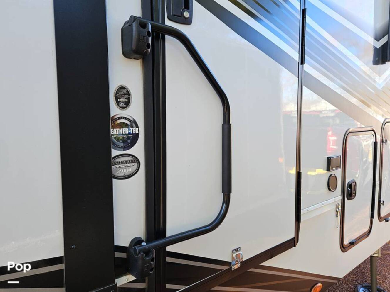 A photo of this 2023 Grand Design Momentum 398M