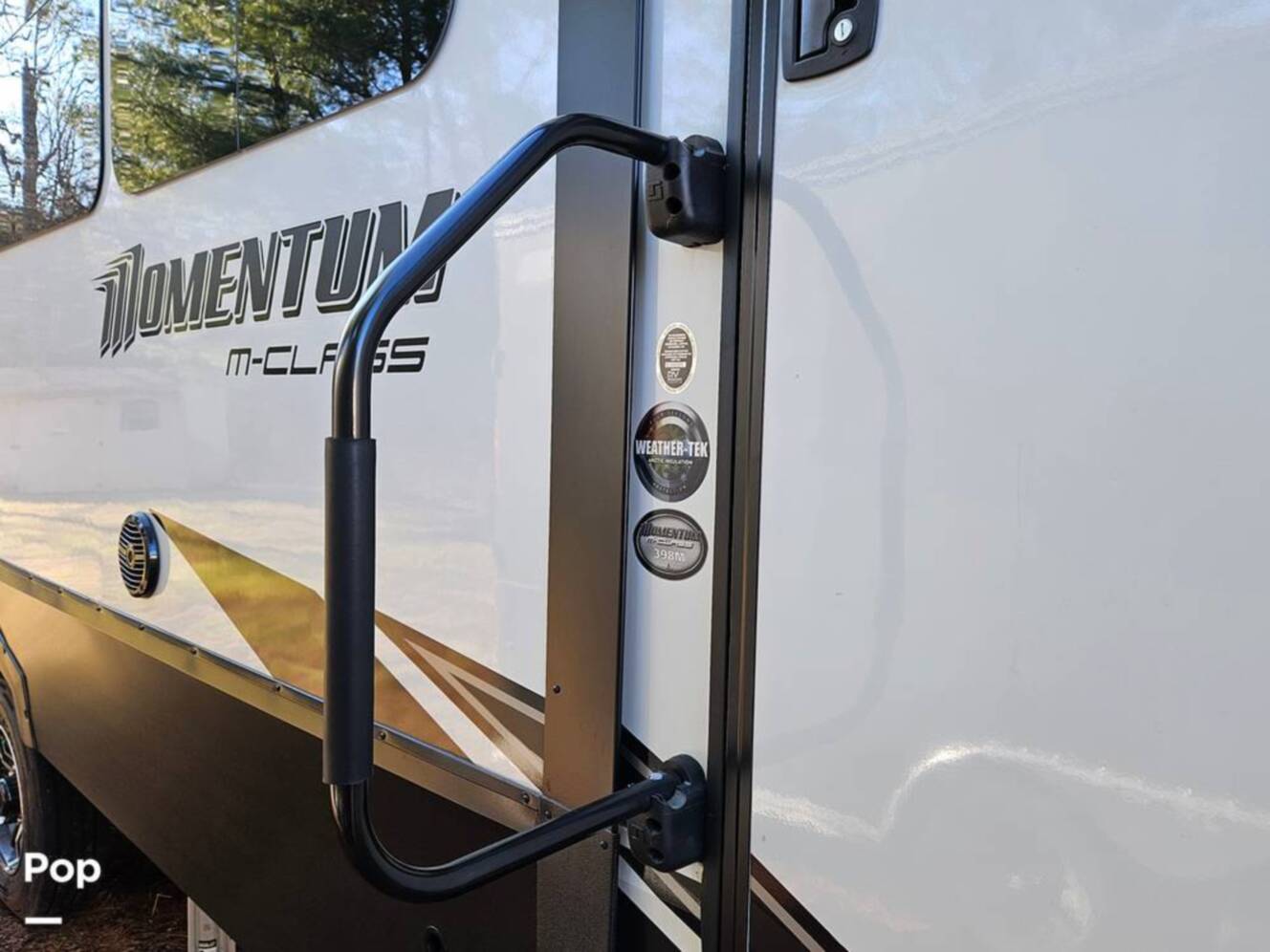 A photo of this 2023 Grand Design Momentum 398M