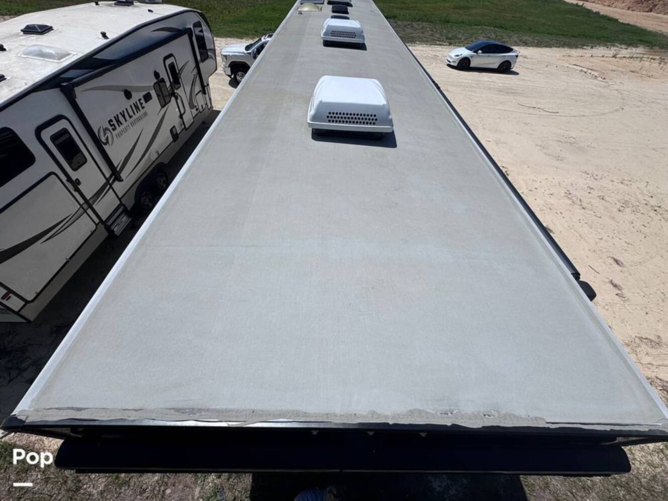 A photo of this 2023 Forest River Riverstone 45BATH Toy Hauler