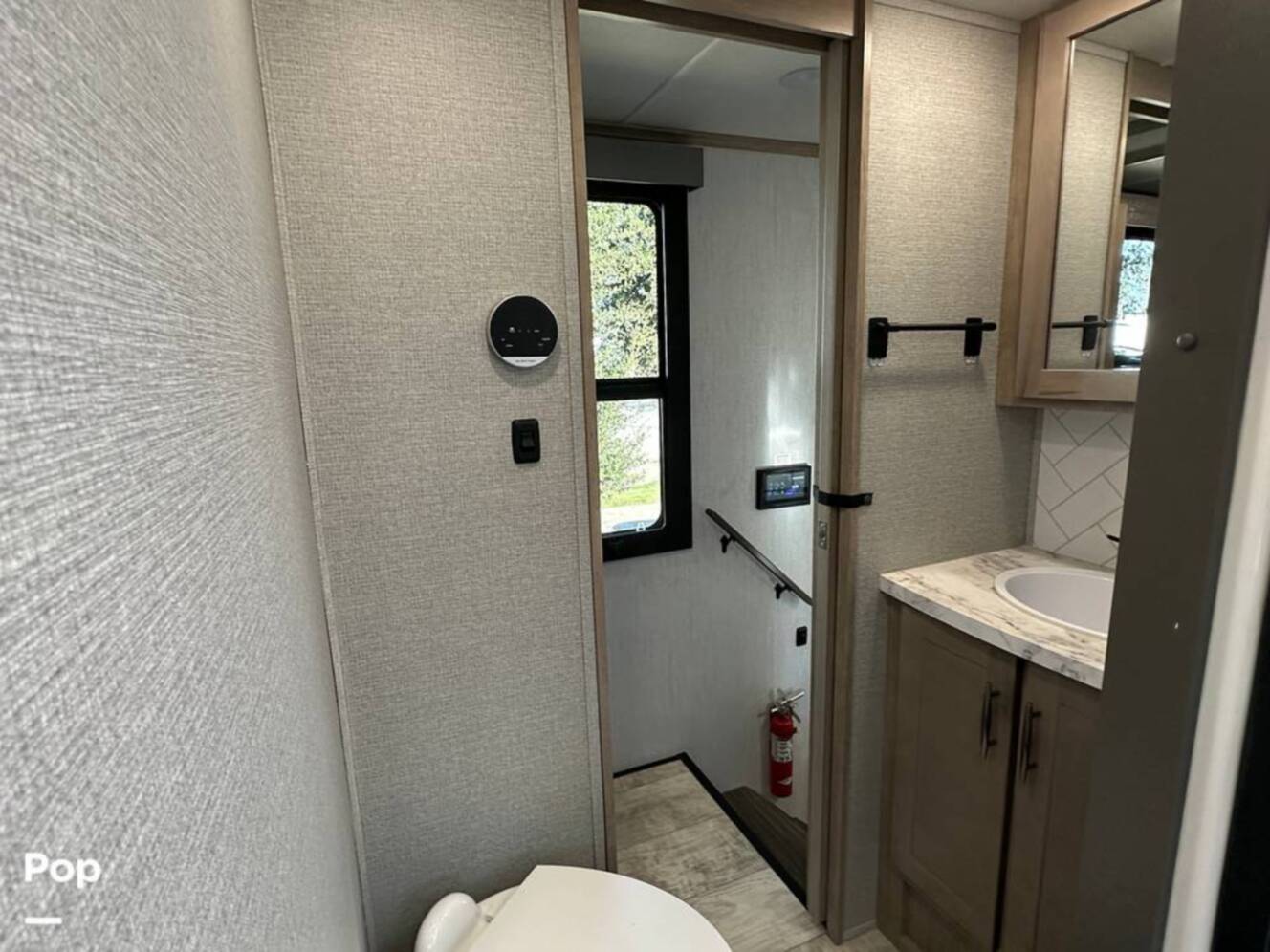 A photo of this 2024 Grand Design Momentum 395MS