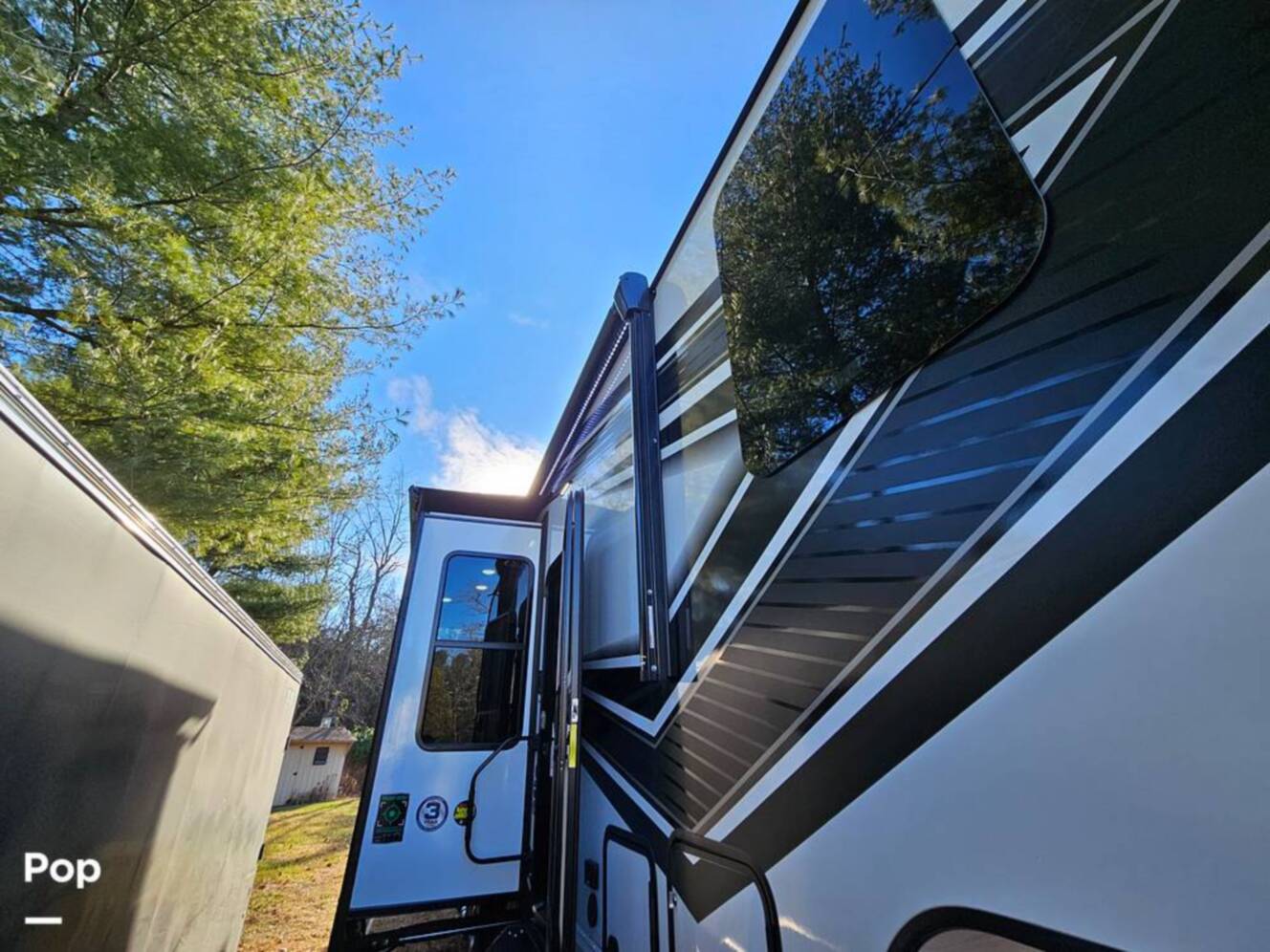 A photo of this 2023 Grand Design Momentum 398M