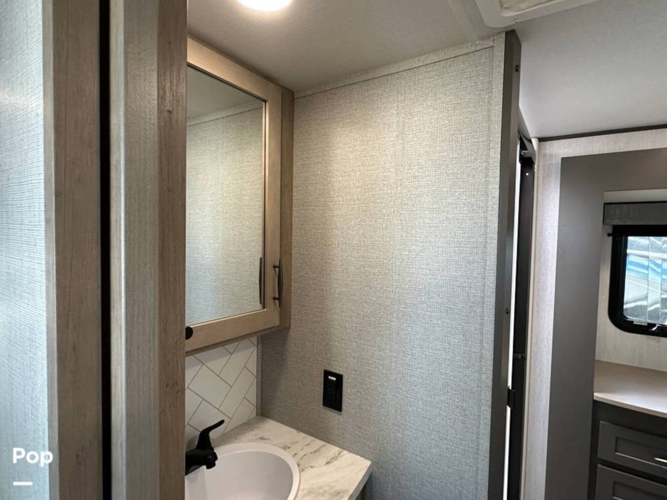 A photo of this 2024 Grand Design Momentum 395MS