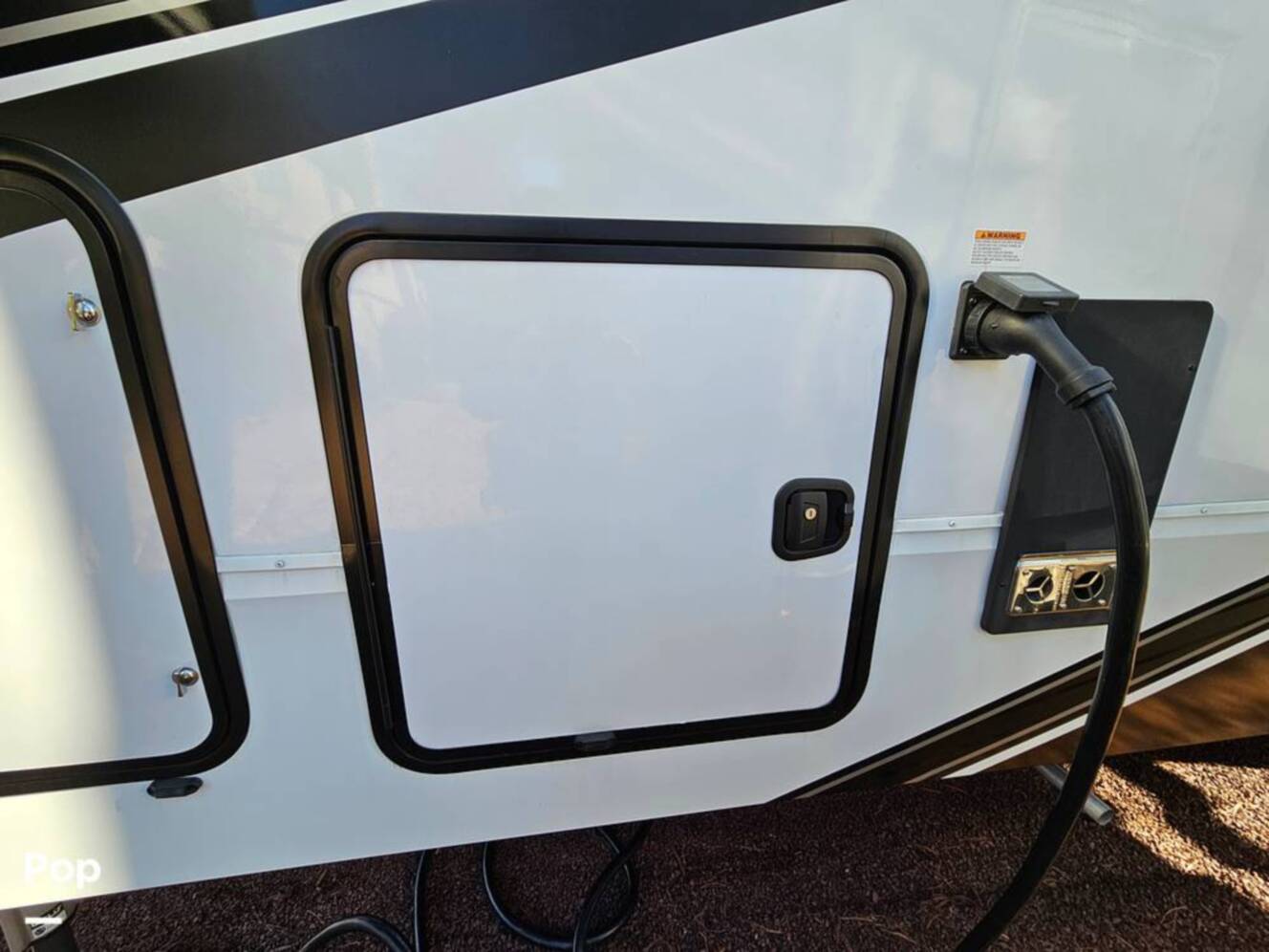 A photo of this 2023 Grand Design Momentum 398M