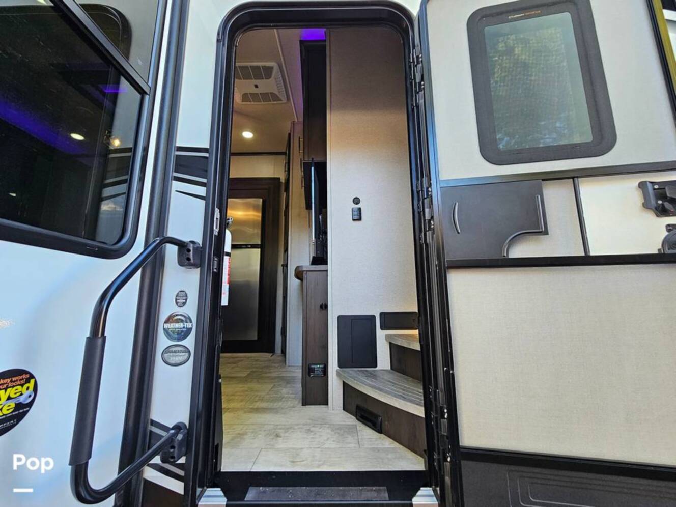 A photo of this 2023 Grand Design Momentum 398M