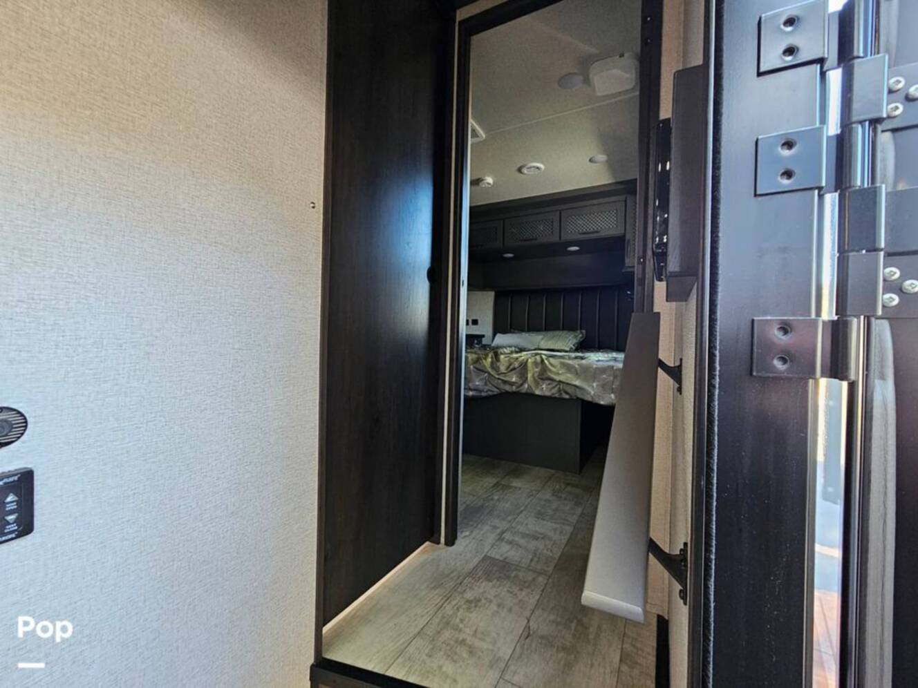 A photo of this 2023 Grand Design Momentum 398M