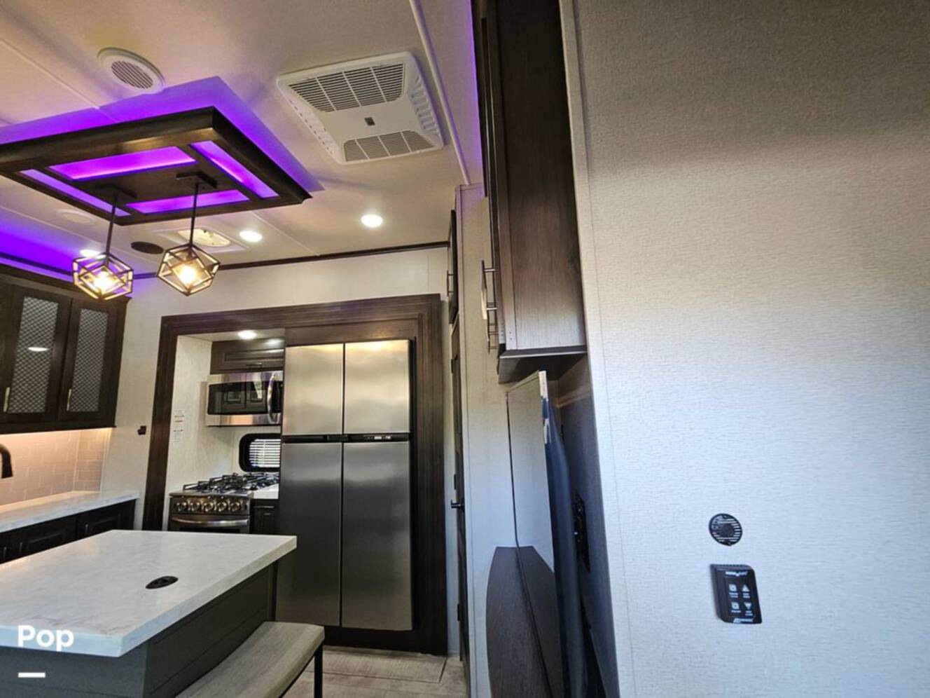 A photo of this 2023 Grand Design Momentum 398M