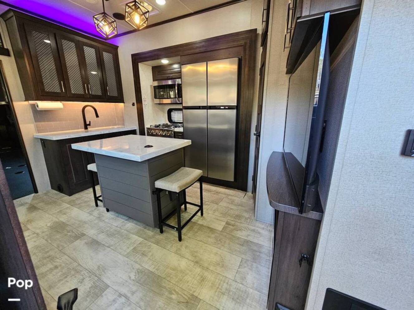 A photo of this 2023 Grand Design Momentum 398M