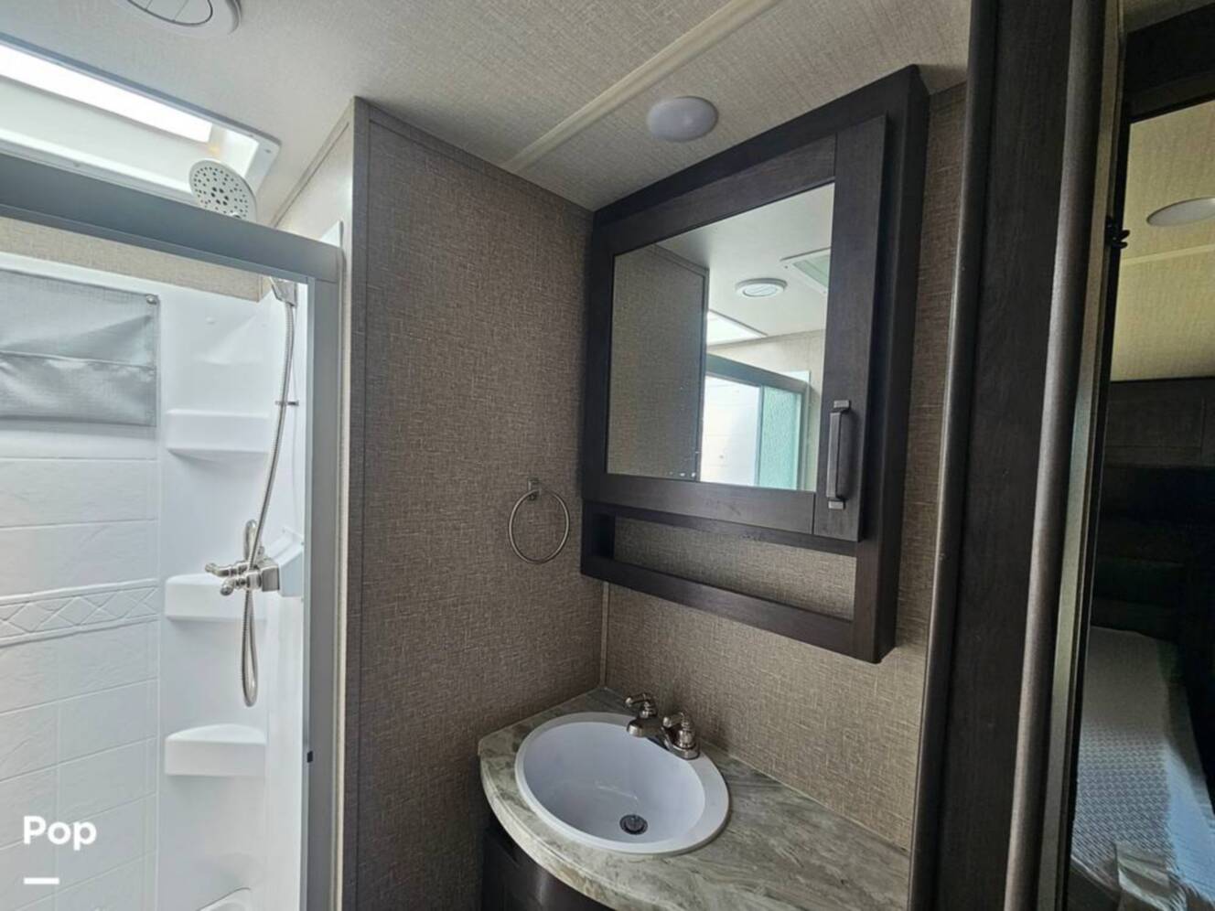 A photo of this 2022 Grand Design Reflection 295RL