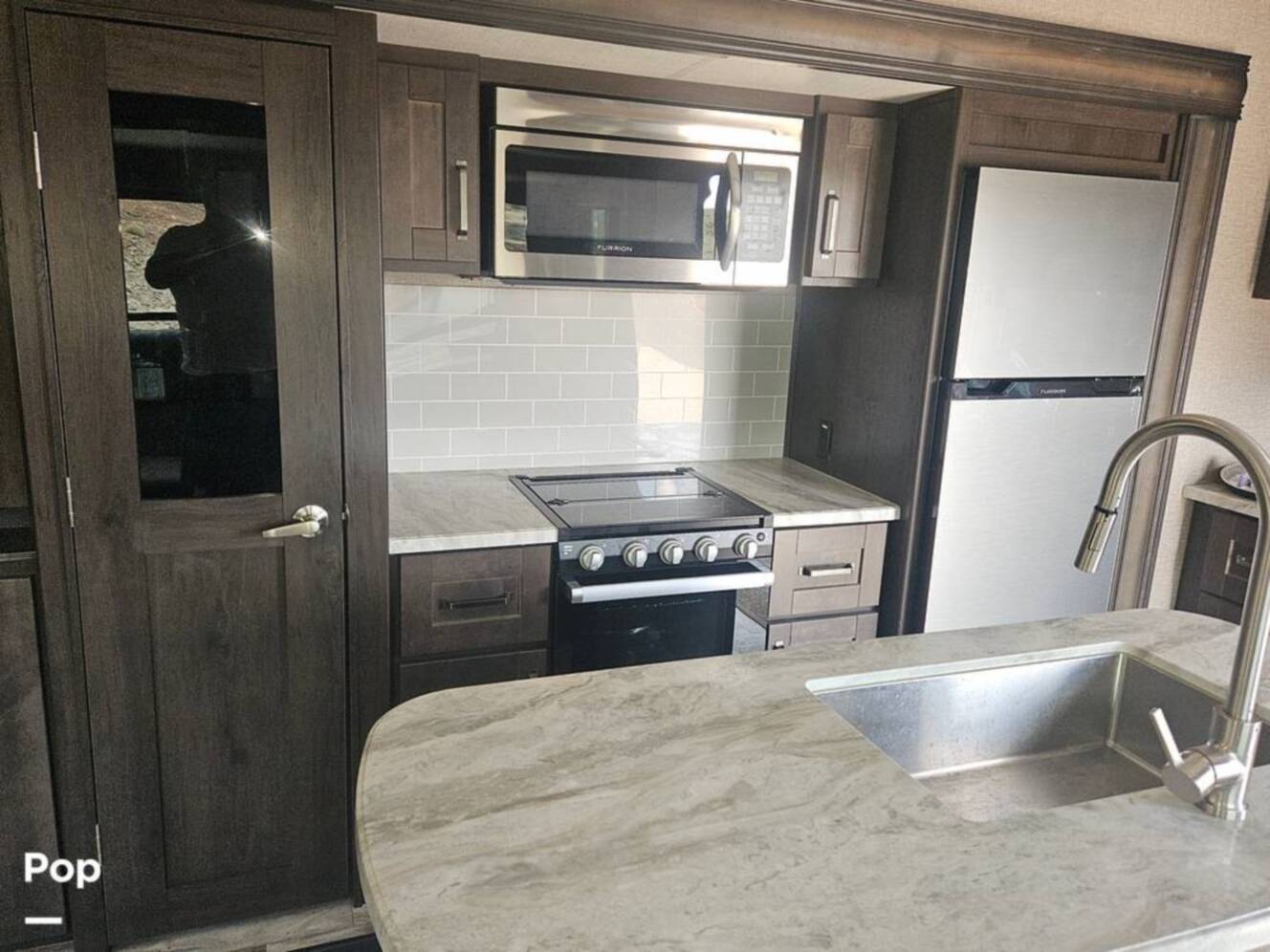 A photo of this 2022 Grand Design Reflection 295RL