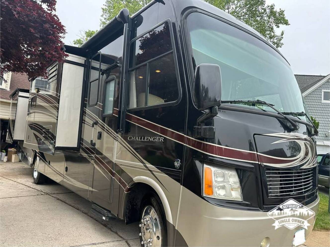 A photo of this 2013 Thor Motor Coach Challenger 37DT