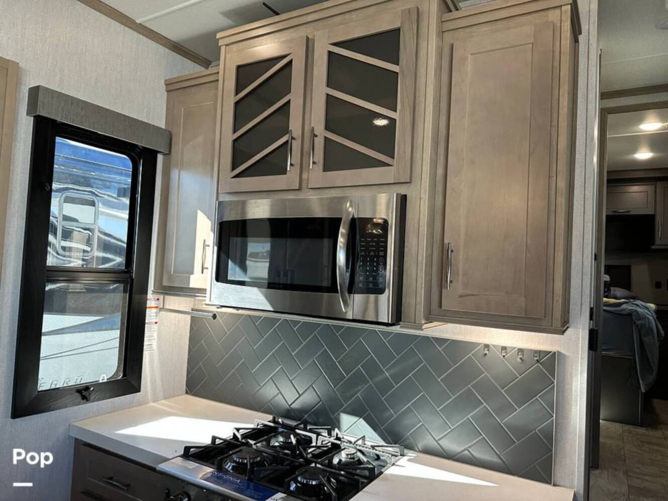 A photo of this 2024 Grand Design Momentum 395MS