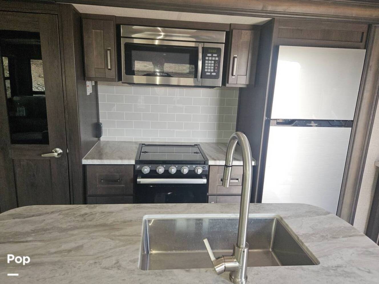 A photo of this 2022 Grand Design Reflection 295RL