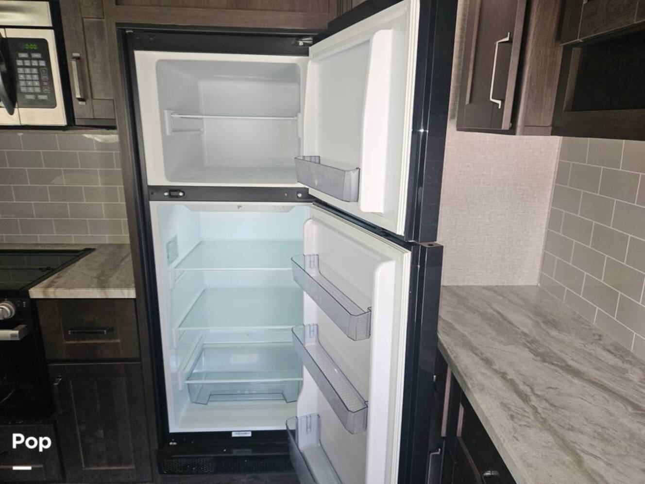 A photo of this 2022 Grand Design Reflection 295RL