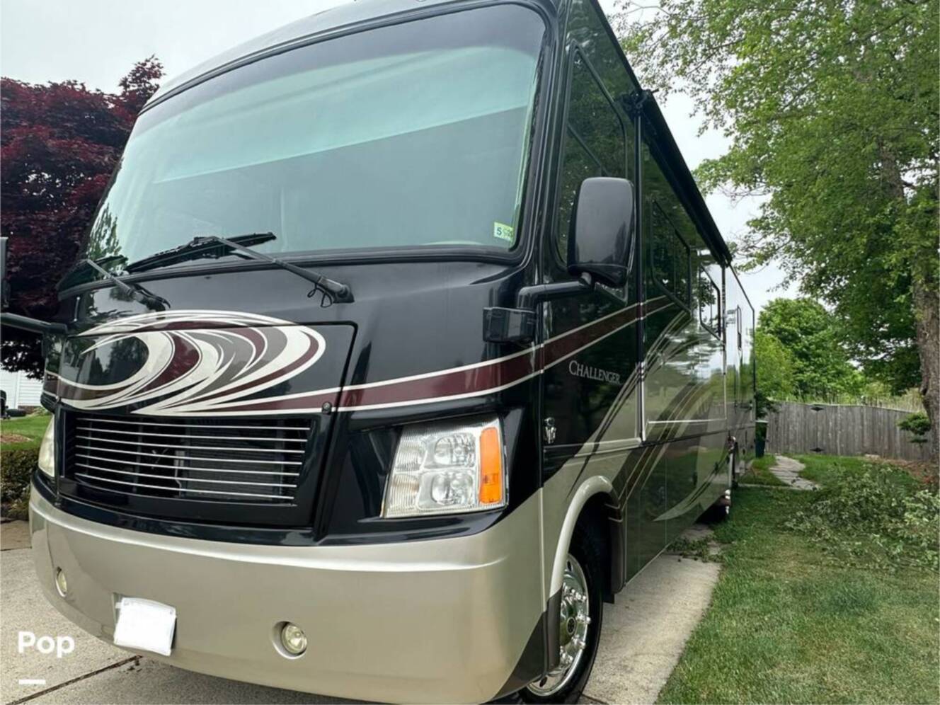 A photo of this 2013 Thor Motor Coach Challenger 37DT