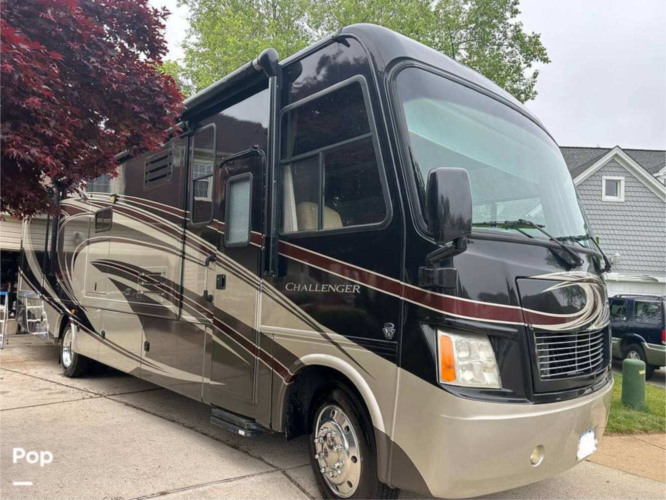 A photo of this 2013 Thor Motor Coach Challenger 37DT