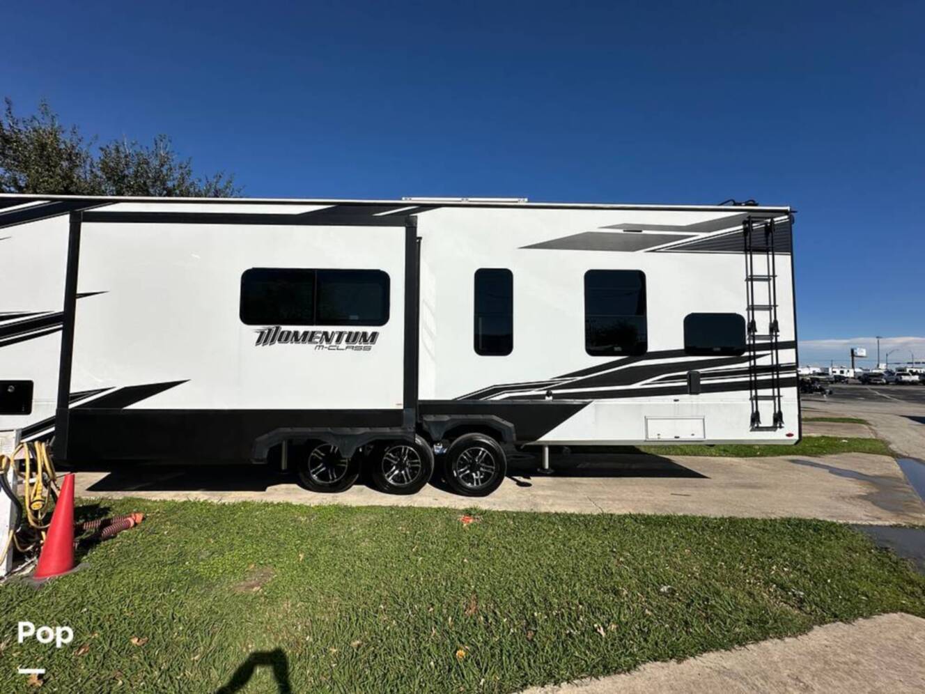 A photo of this 2024 Grand Design Momentum 395MS