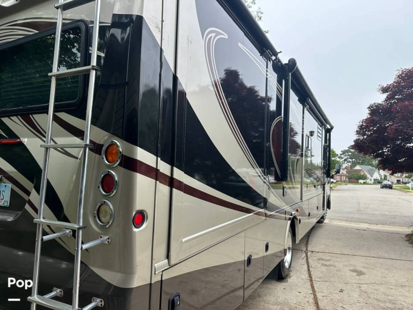 A photo of this 2013 Thor Motor Coach Challenger 37DT