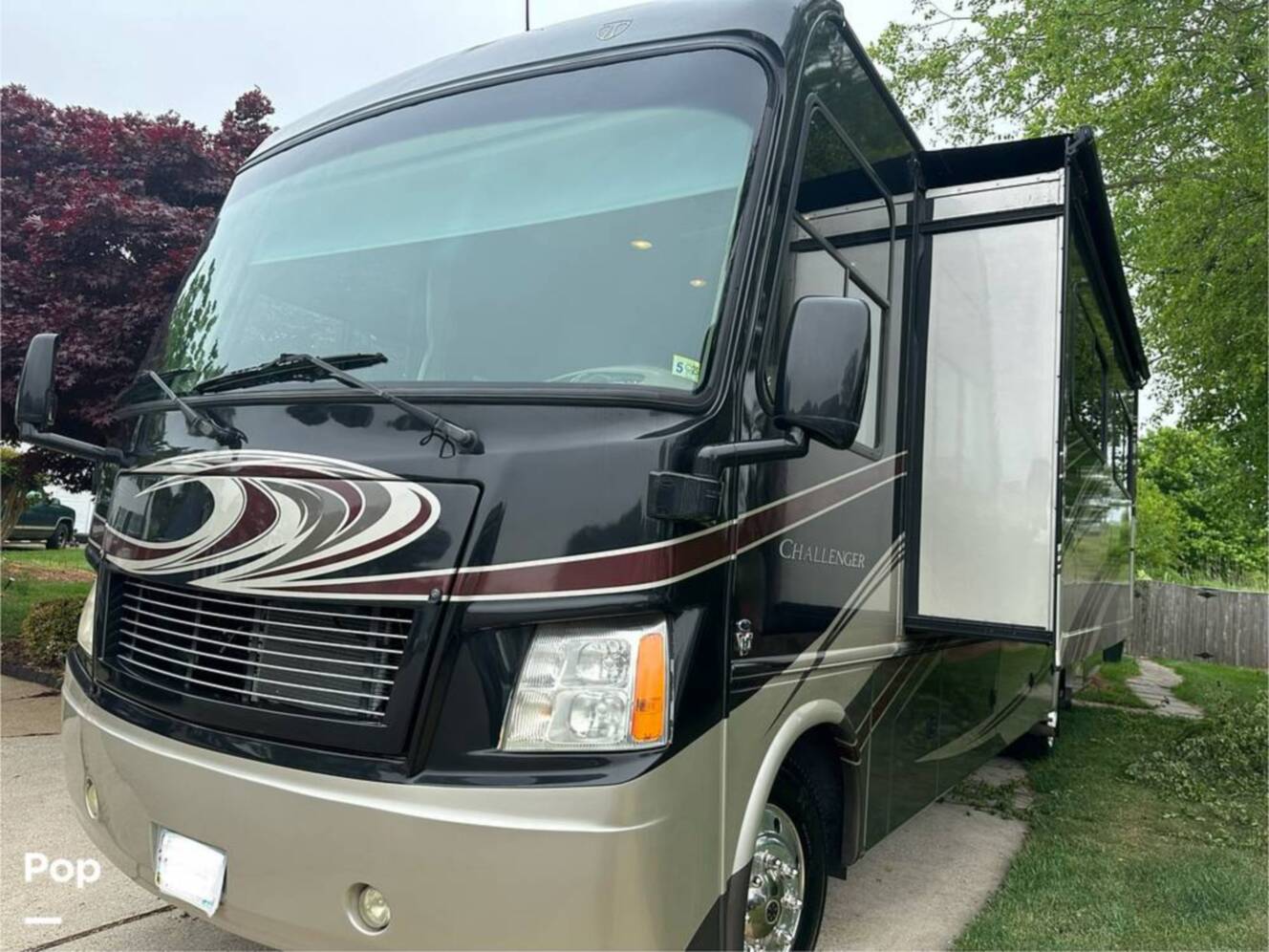 A photo of this 2013 Thor Motor Coach Challenger 37DT