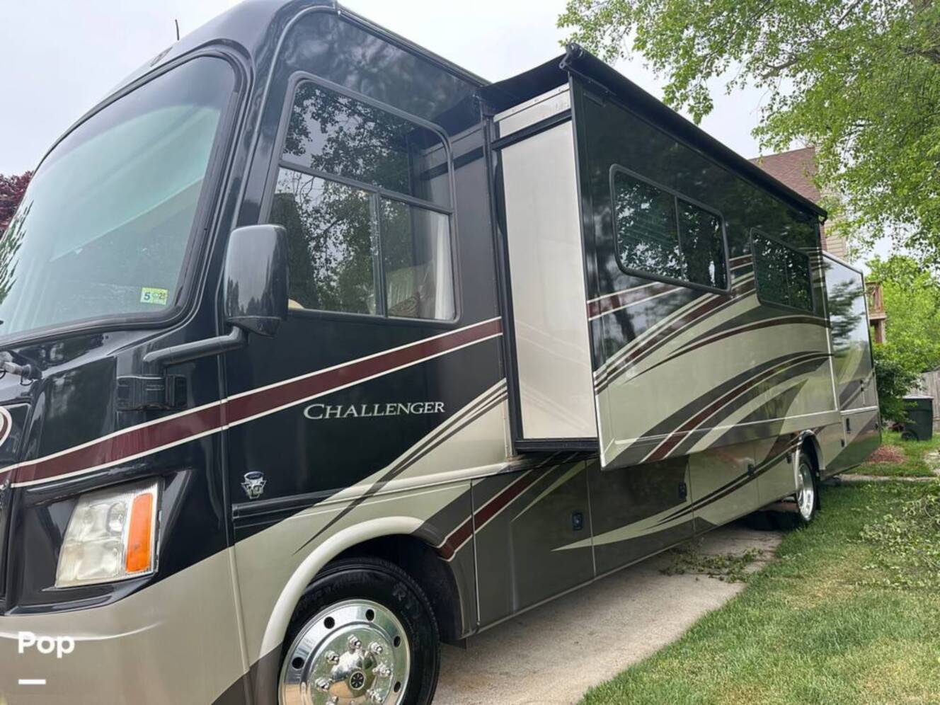 A photo of this 2013 Thor Motor Coach Challenger 37DT
