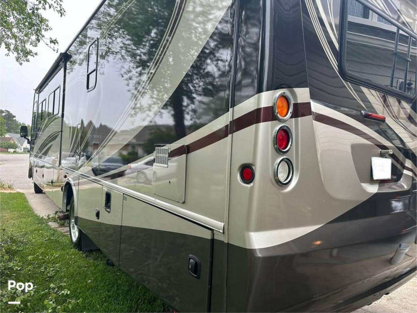 A photo of this 2013 Thor Motor Coach Challenger 37DT