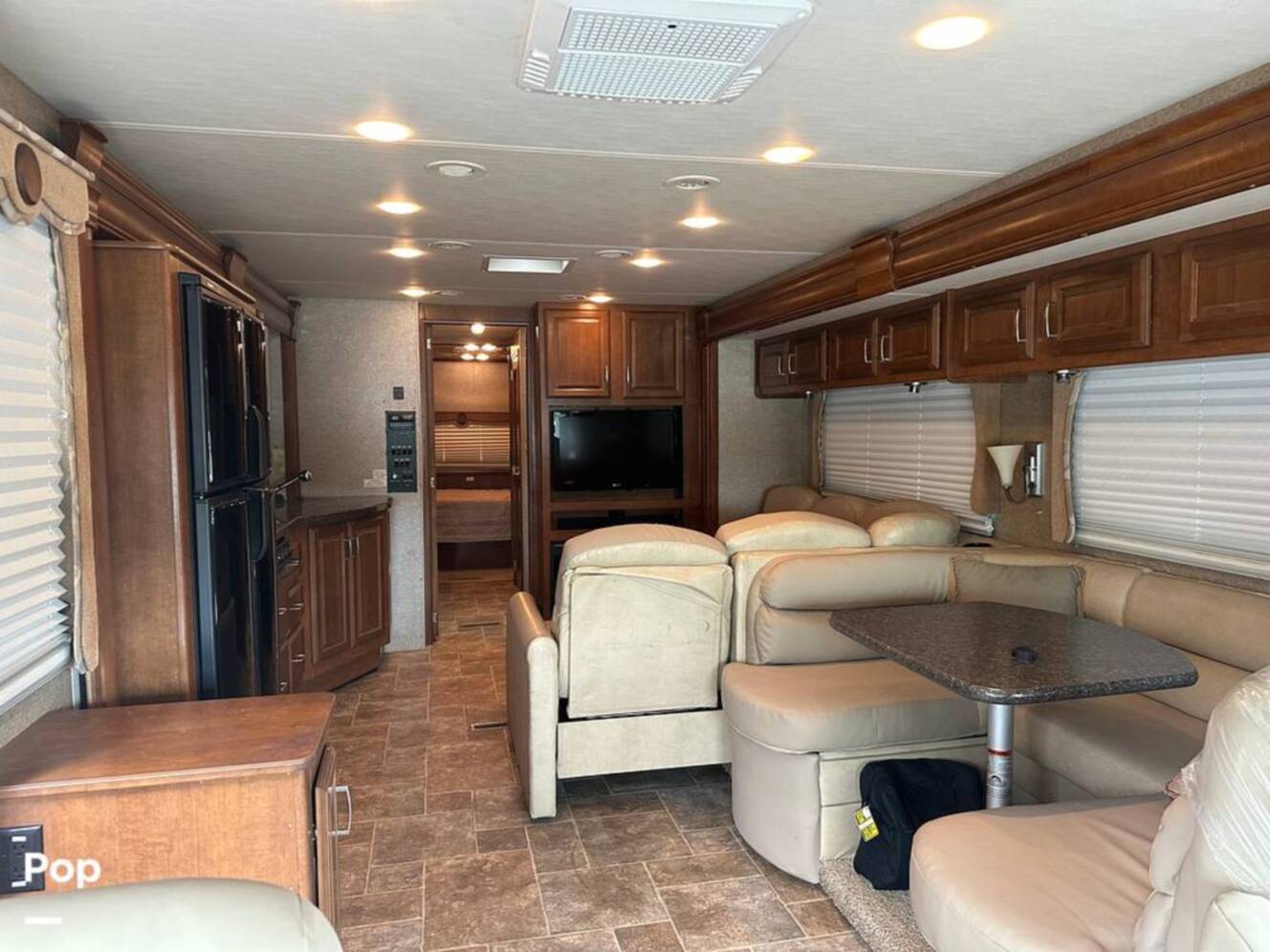 A photo of this 2013 Thor Motor Coach Challenger 37DT