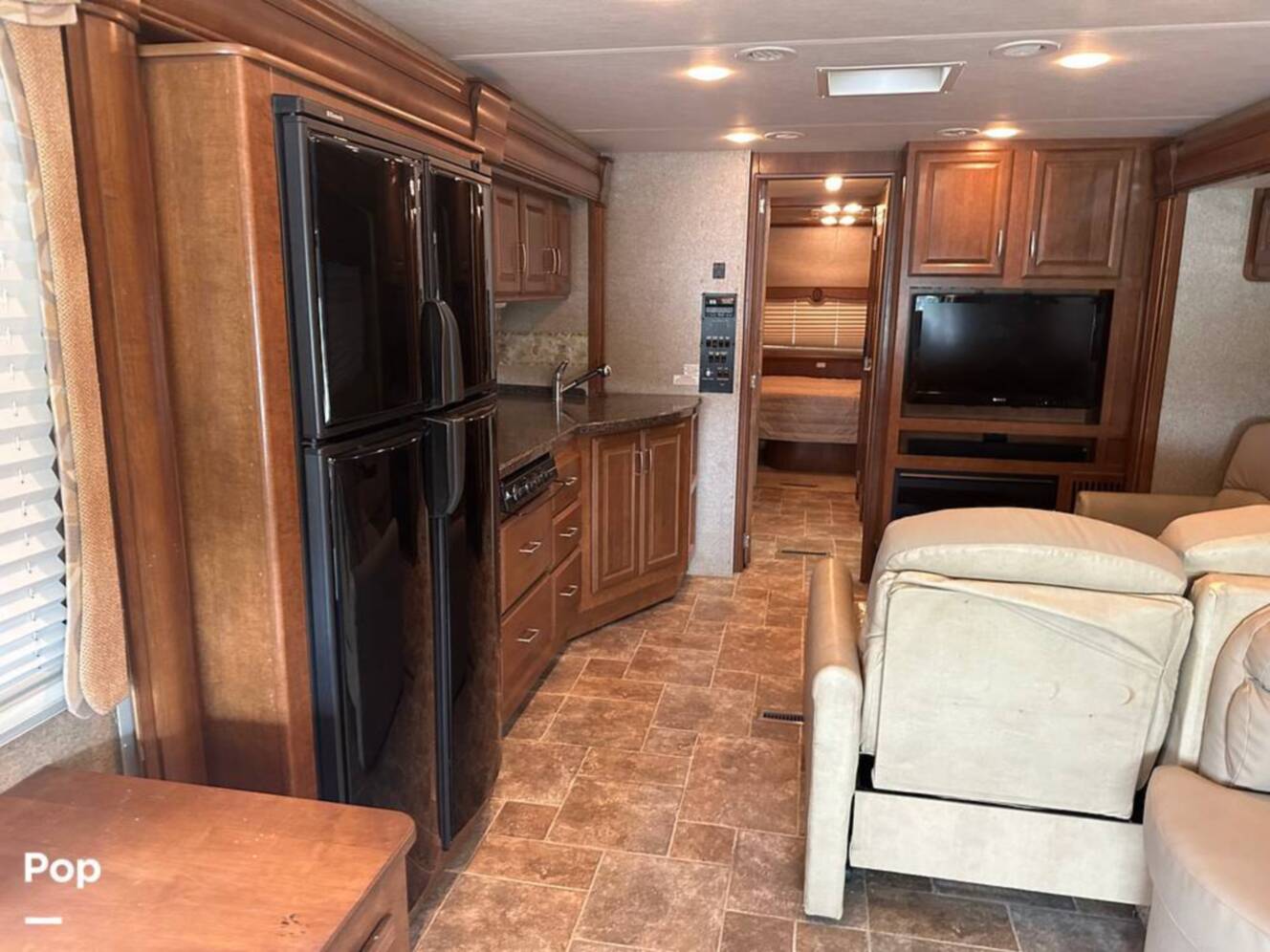 A photo of this 2013 Thor Motor Coach Challenger 37DT