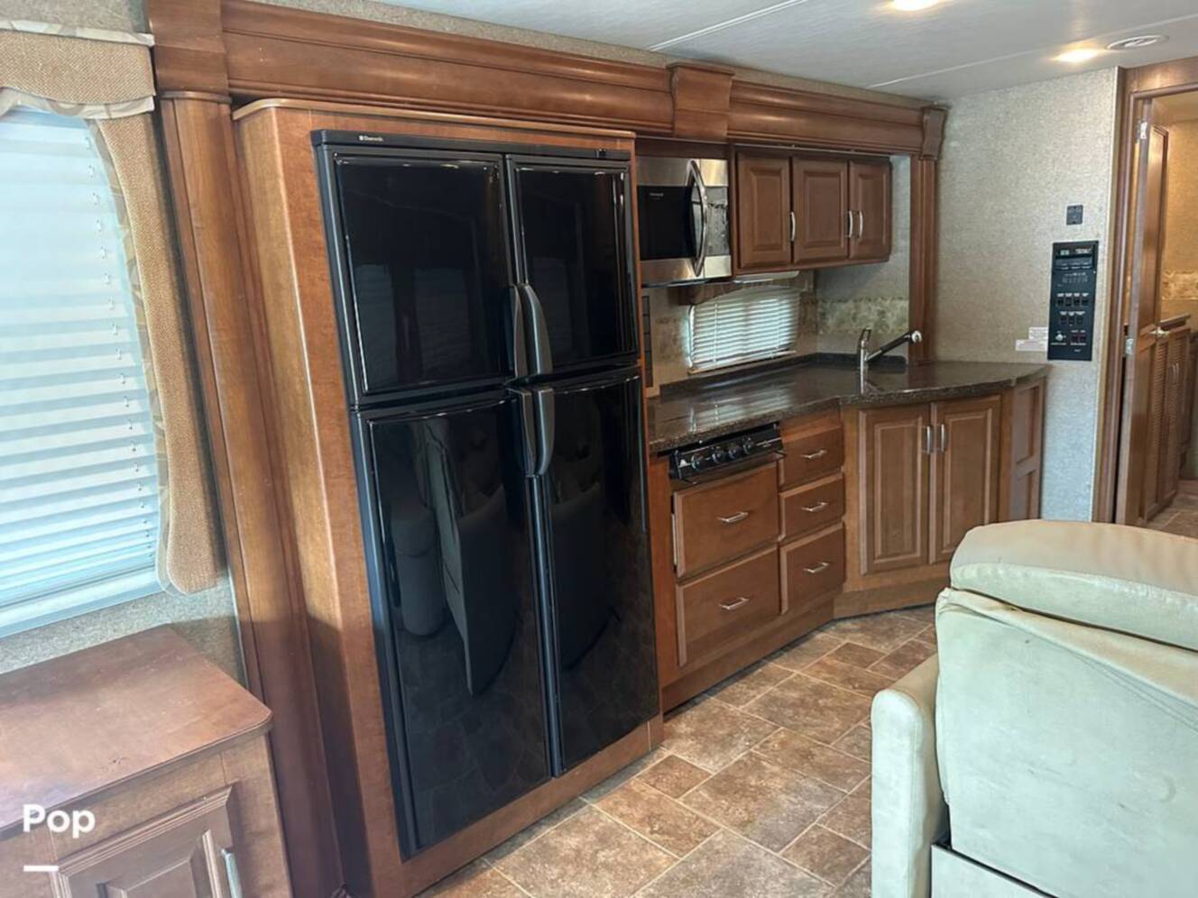 A photo of this 2013 Thor Motor Coach Challenger 37DT