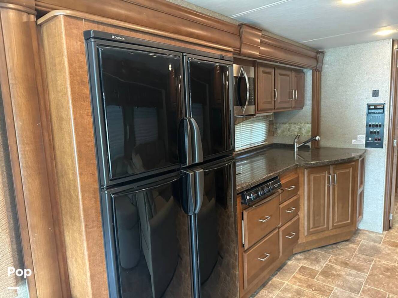A photo of this 2013 Thor Motor Coach Challenger 37DT