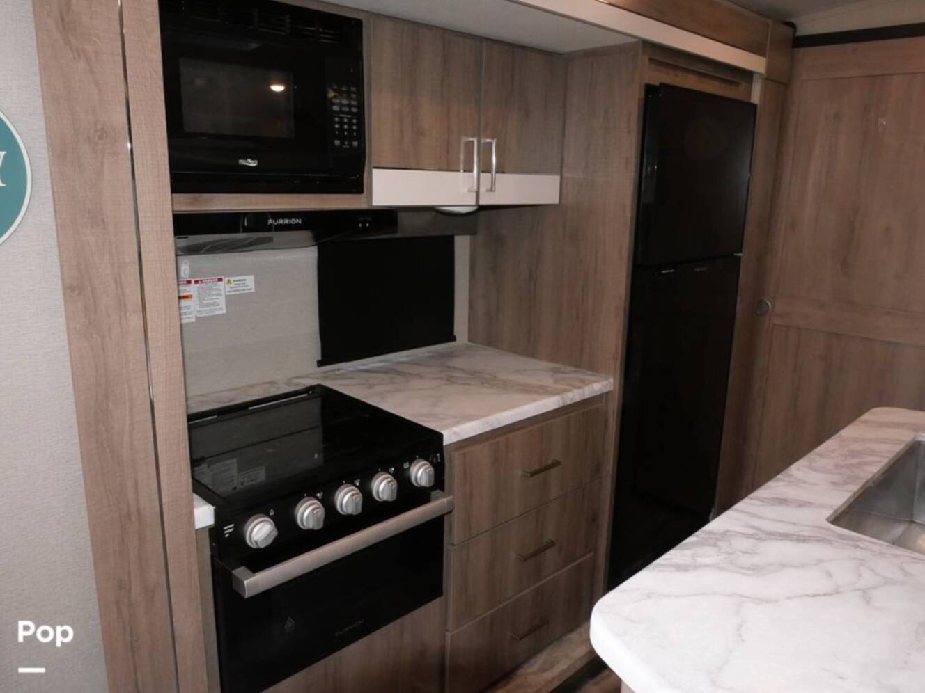 A photo of this 2022 Grand Design Imagine 3250BH