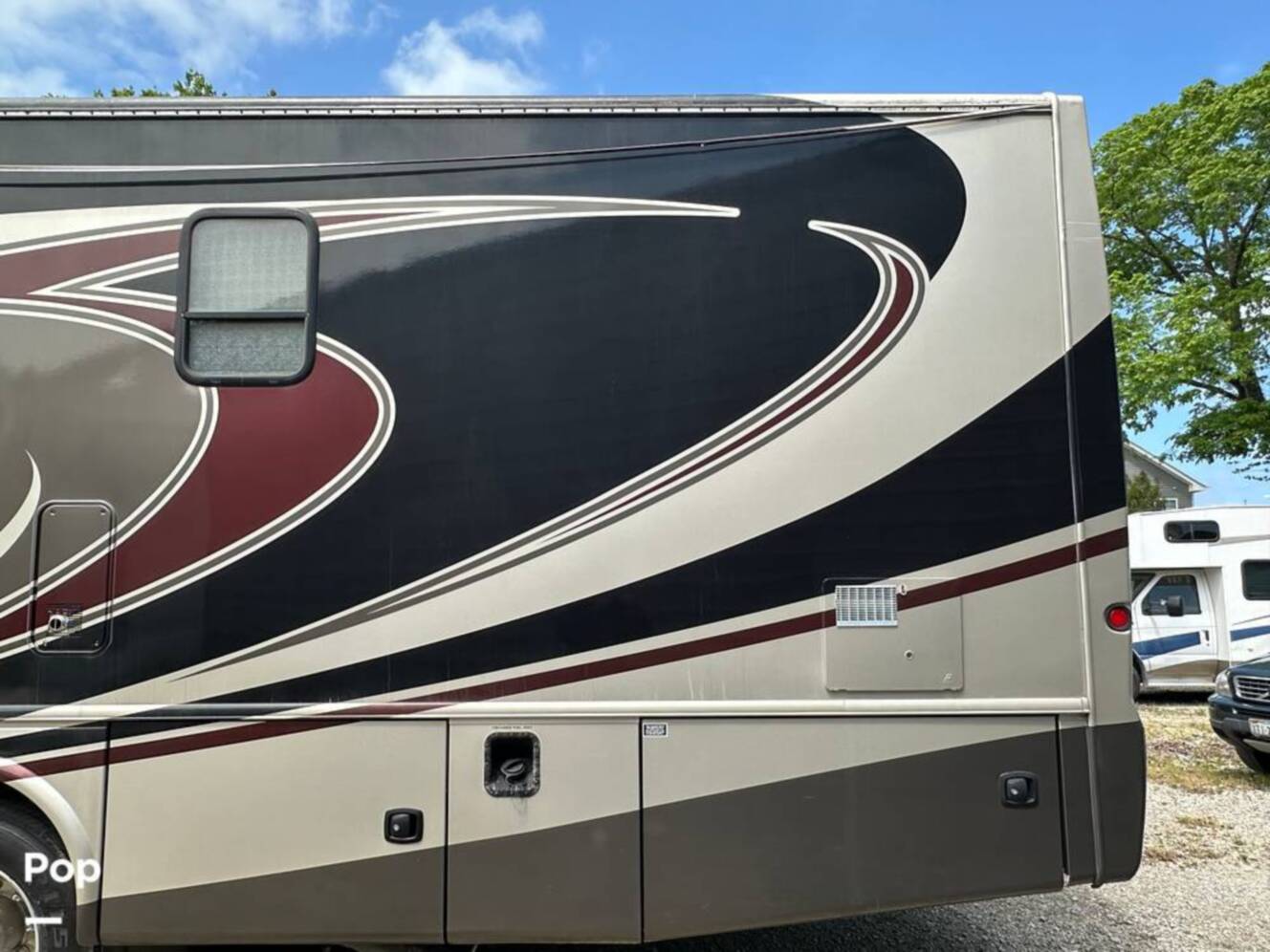 A photo of this 2013 Thor Motor Coach Challenger 37DT