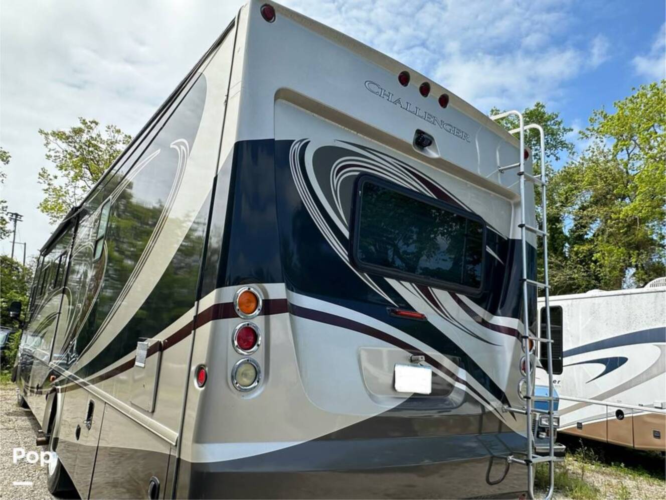 A photo of this 2013 Thor Motor Coach Challenger 37DT