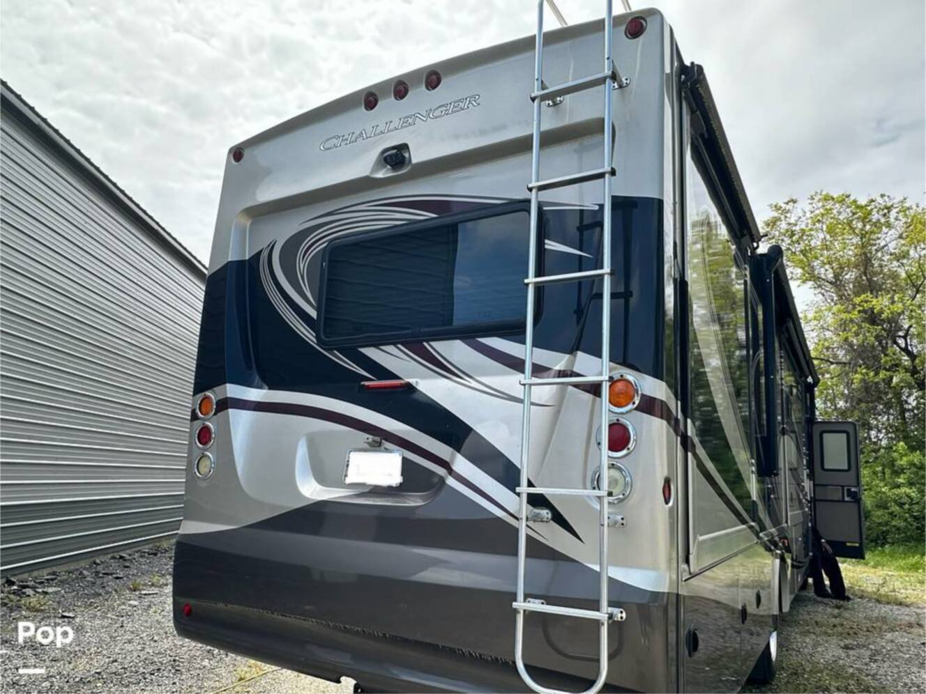 A photo of this 2013 Thor Motor Coach Challenger 37DT