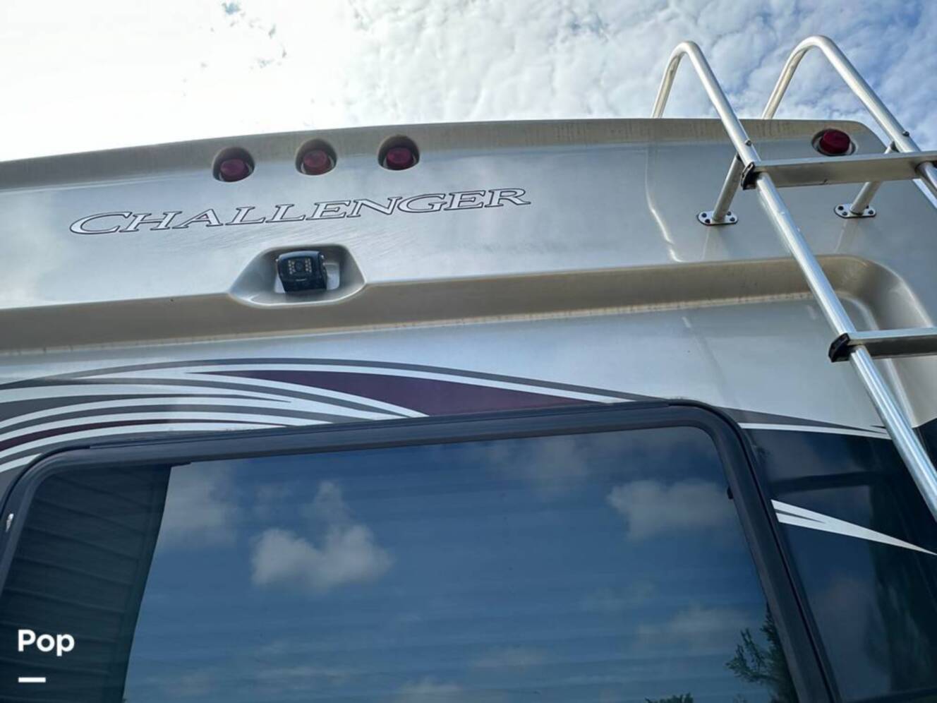 A photo of this 2013 Thor Motor Coach Challenger 37DT