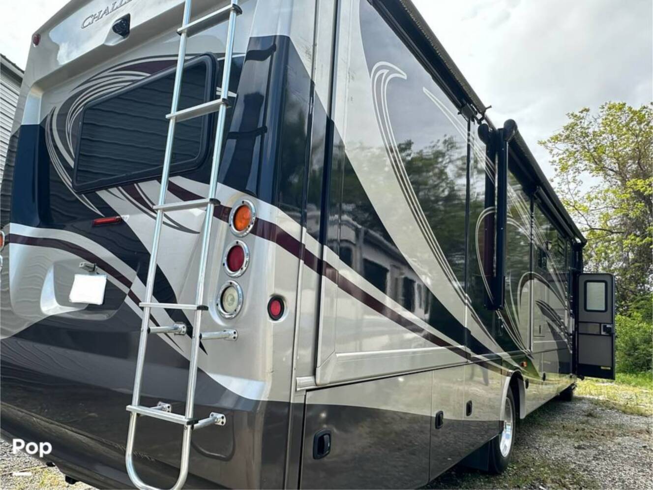 A photo of this 2013 Thor Motor Coach Challenger 37DT