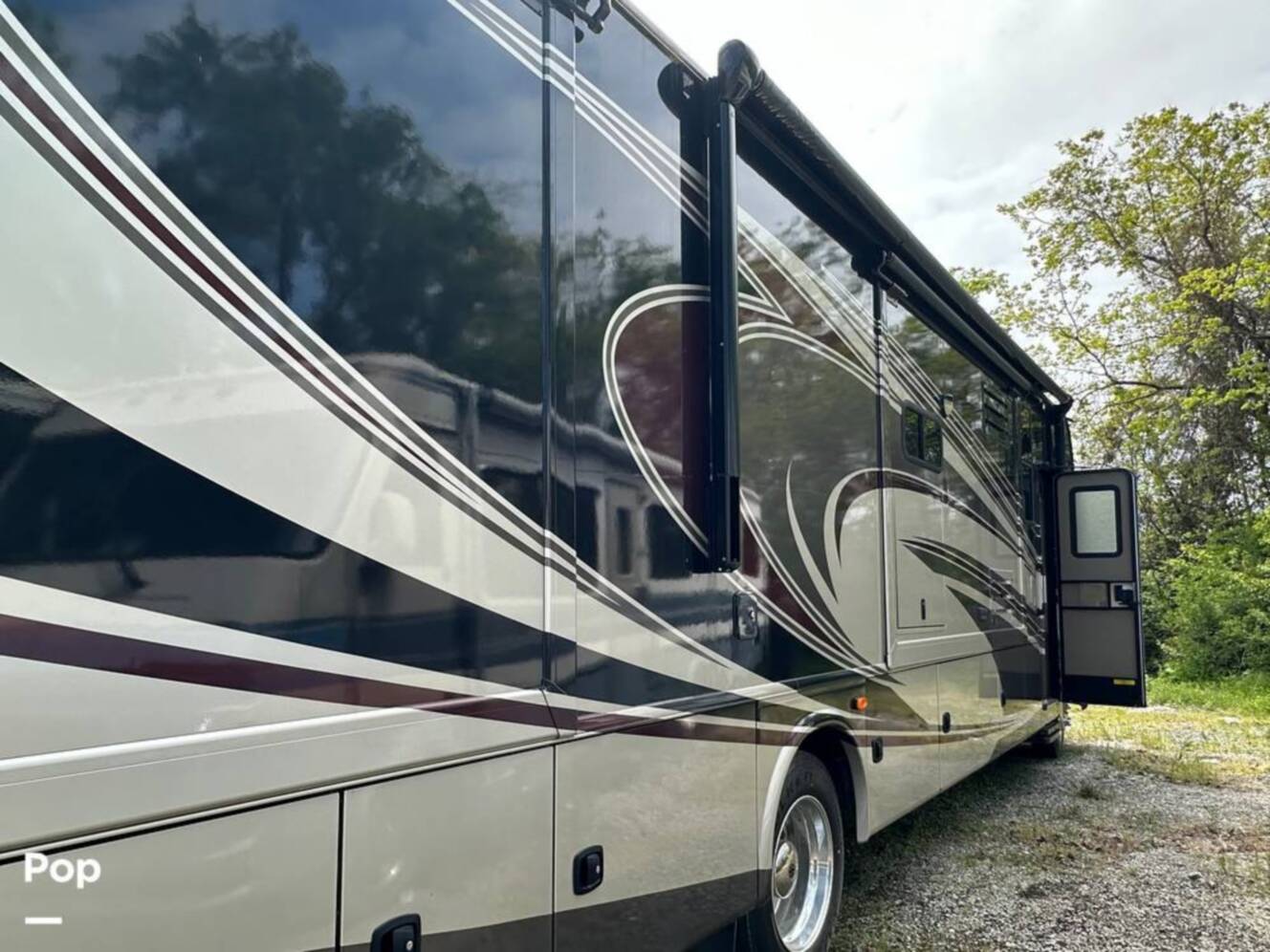 A photo of this 2013 Thor Motor Coach Challenger 37DT