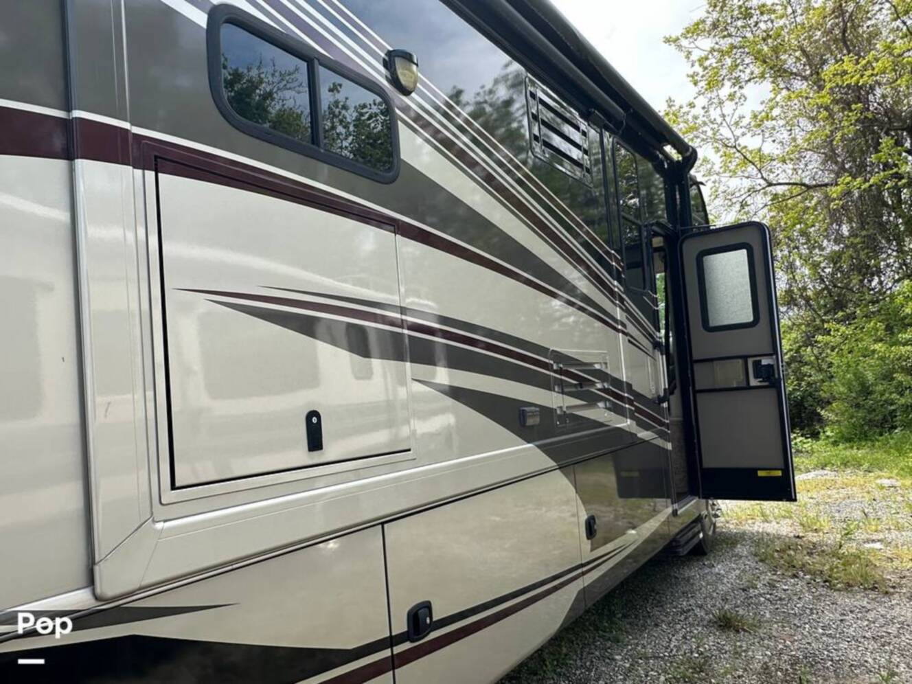A photo of this 2013 Thor Motor Coach Challenger 37DT