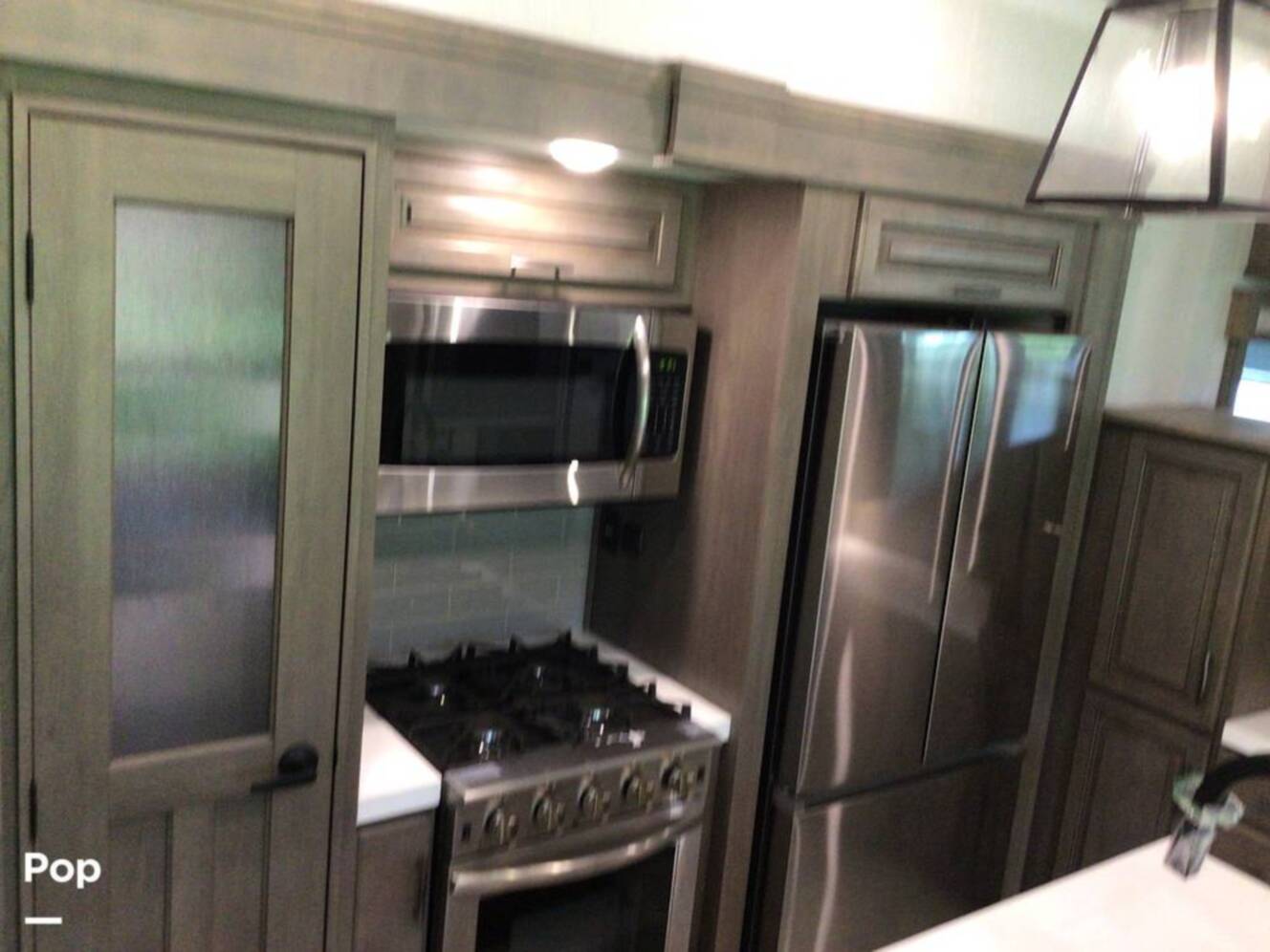A photo of this 2023 Grand Design Solitude 380FL
