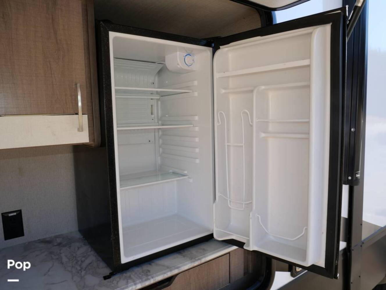 A photo of this 2022 Grand Design Imagine 3250BH