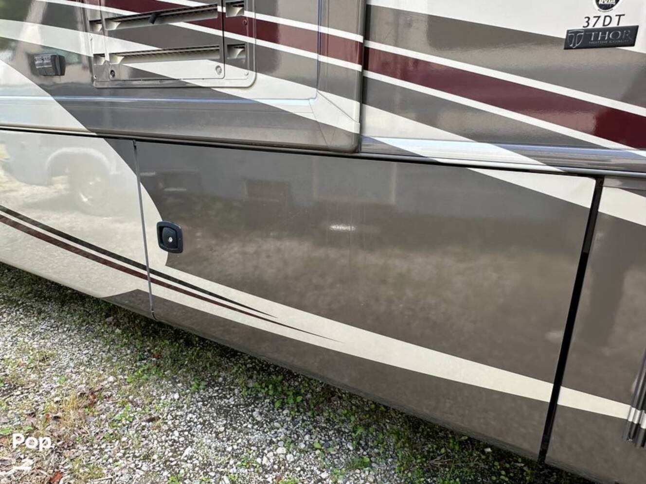 A photo of this 2013 Thor Motor Coach Challenger 37DT