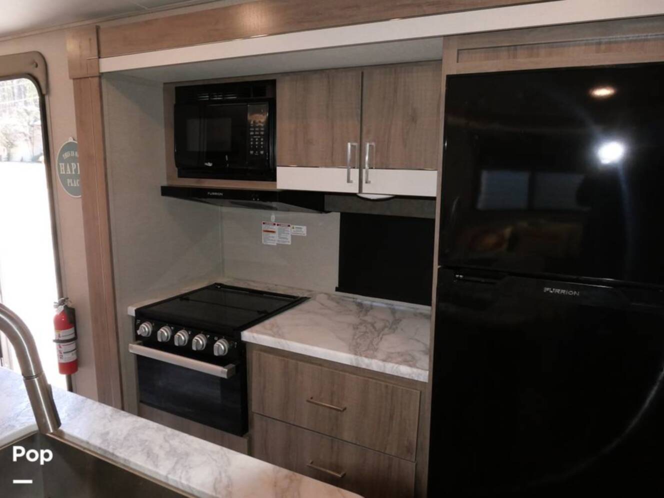 A photo of this 2022 Grand Design Imagine 3250BH