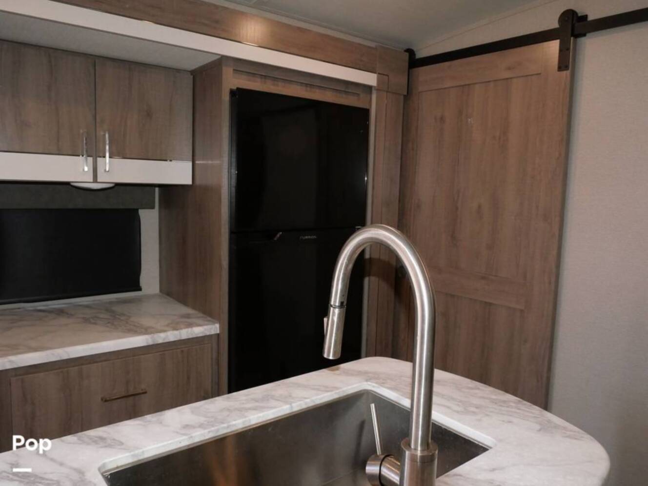 A photo of this 2022 Grand Design Imagine 3250BH