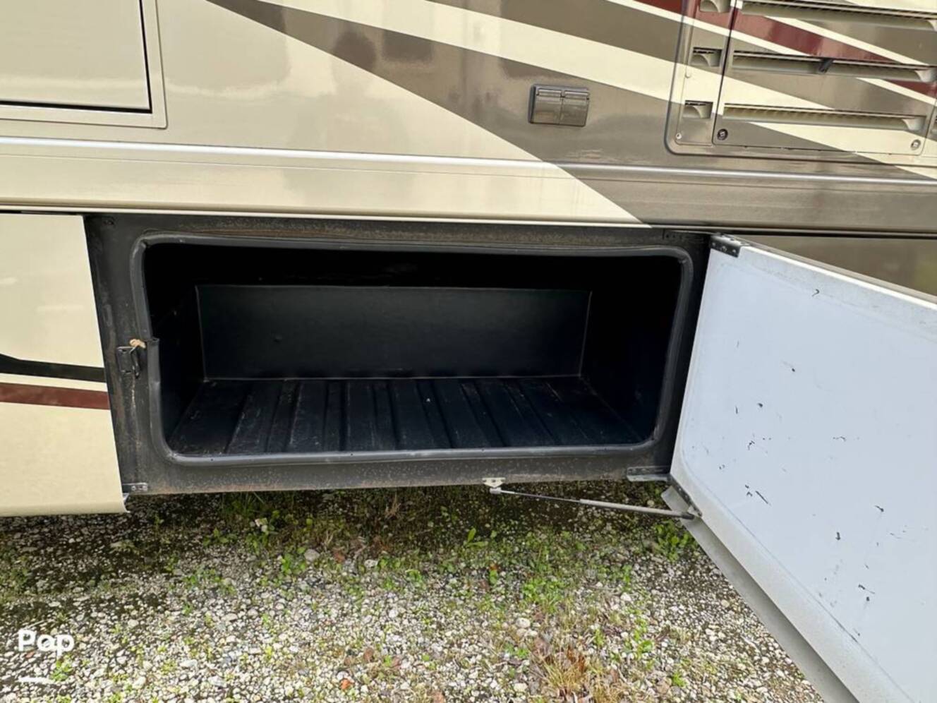 A photo of this 2013 Thor Motor Coach Challenger 37DT