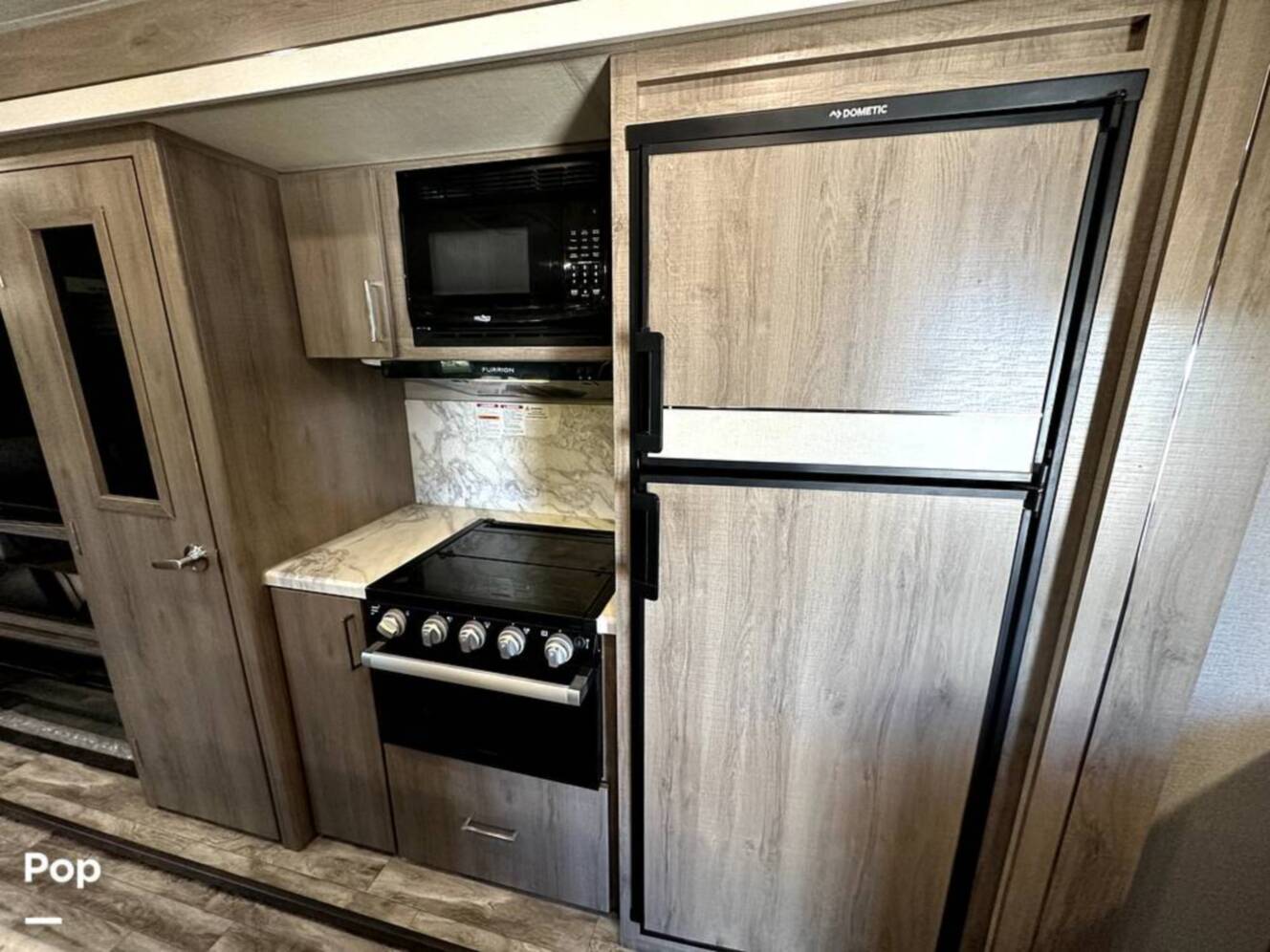 A photo of this 2022 Grand Design Imagine 2970RL